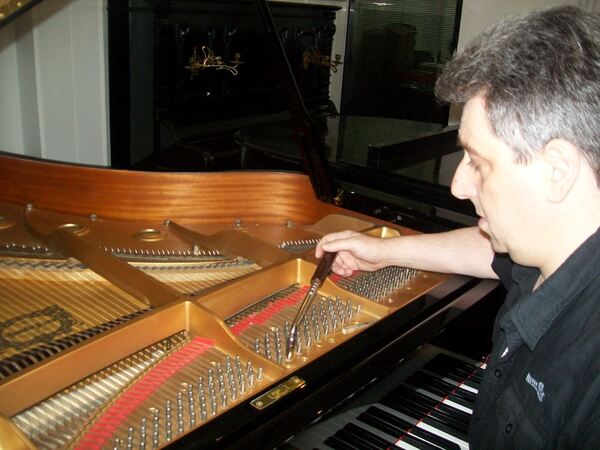 Afinador de pianos. Lisboa. Pianos e Teclados