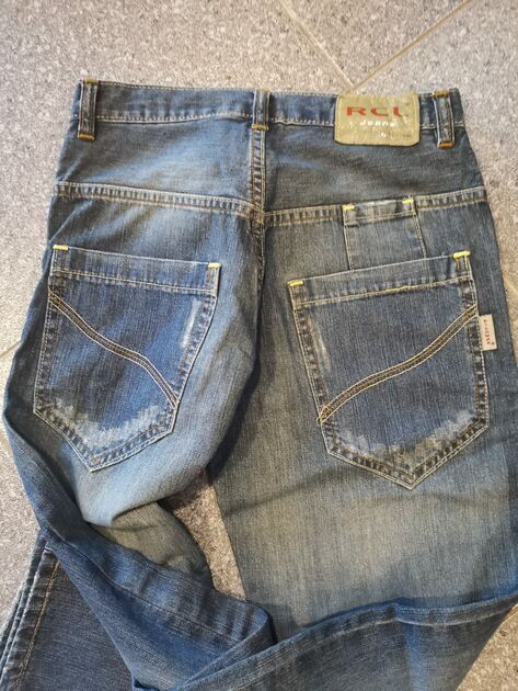 Calça ganga 32 menino. Calcas