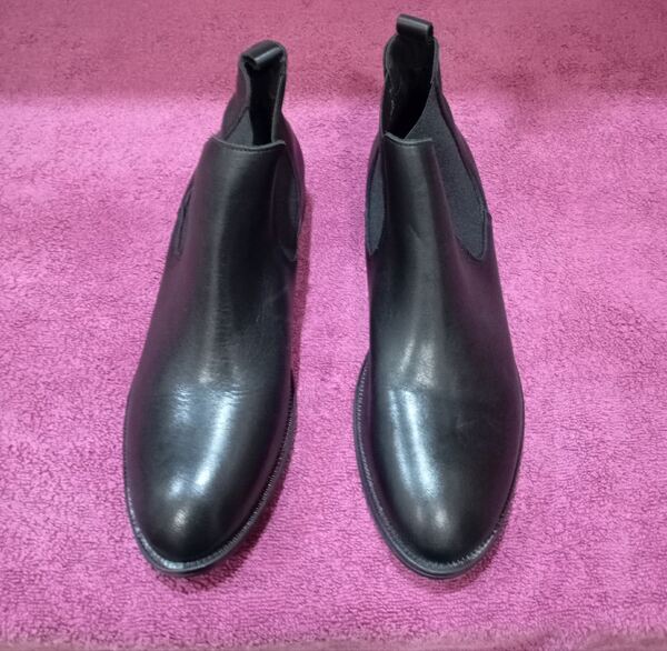 botas ou botins. Botas e botins