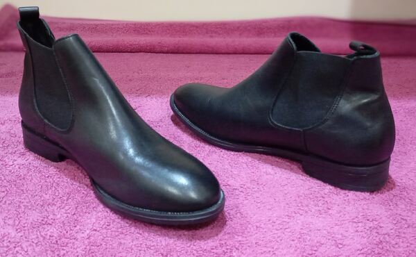 botas ou botins. Botas e botins