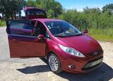 Ford Titaniun  Gazolina. Carros. Tomar. 2009   160.000 km Manual Gasolina 60 cv 5 portas Vermelho ABS Ar condicionado Farol de Xénon Vidros eléctricos Volante multi-funções