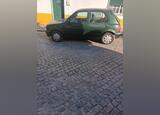 Carro Nissan Micra (1999). Carros