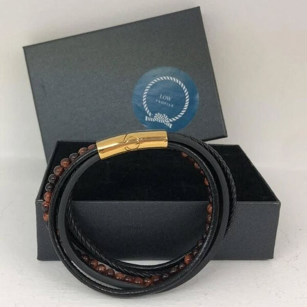 Pulseira multifacetada de couro/aço/pedras. Pulseiras