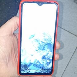 smartphone Xiaomi Redmi note 8 pro com capa vermel. Telemóveis