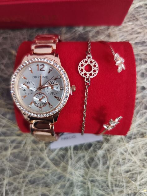 Conjunto Relógio de Senhora dourado mais duas pulseiras da Skyline . Relógios de Pulso