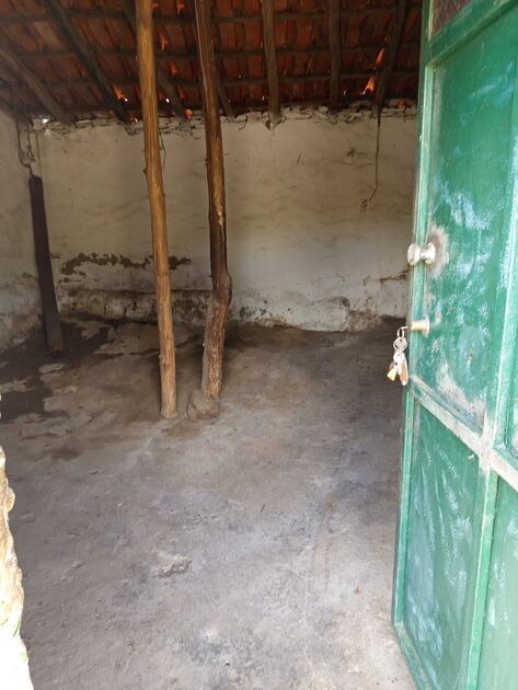 Casa urbana . Terreno Rústico